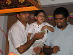 Shaanu helping out to blow the candles