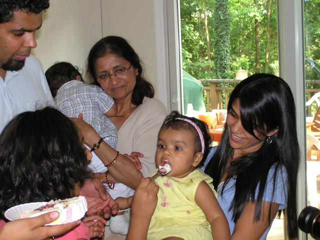 Maya didi feeds Kayla