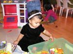 Kayla takes over the play area at the Motani's