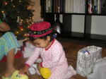 In her cute little cap from India (thanks to Nani/Nana!)