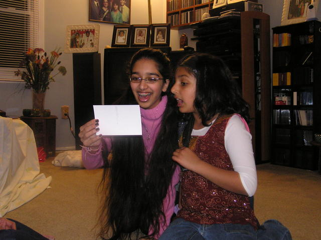 Chandni and Maya excited to open presents
