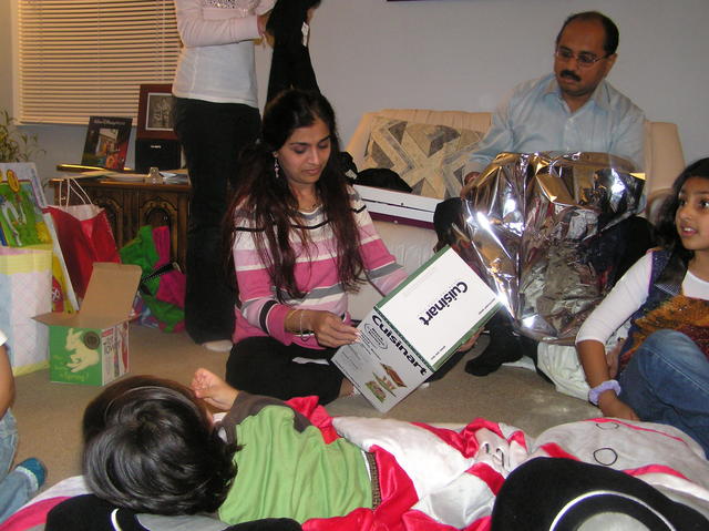 Kaki opens part of her secret santa gift