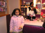 Maya watching "MaKayla" get her hair done