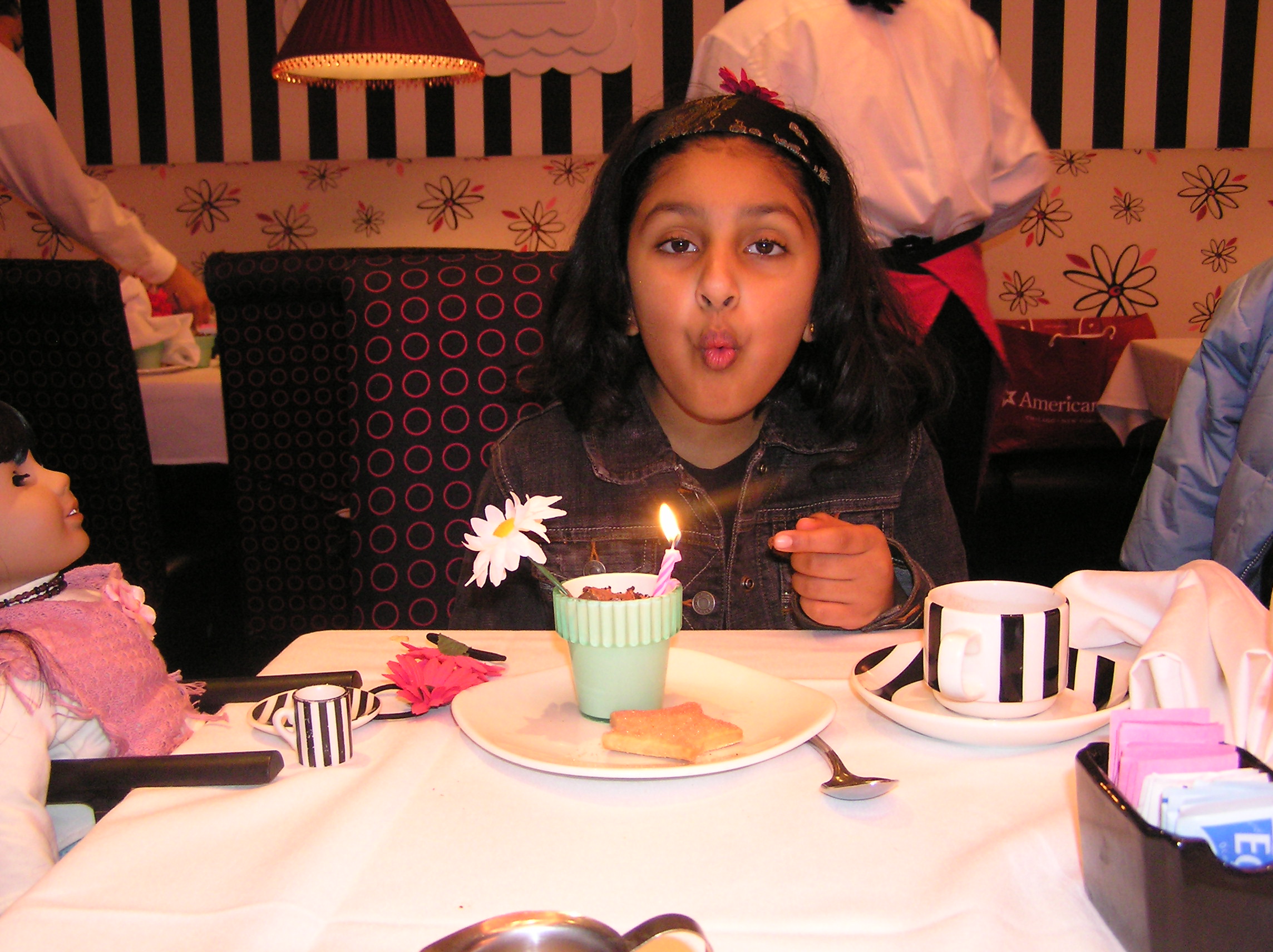 Blowing out the birthday flowerpot