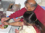 Rajoo Foi and Ramesh Fuaji doing puja