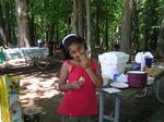 Maya posing with a chip (?)