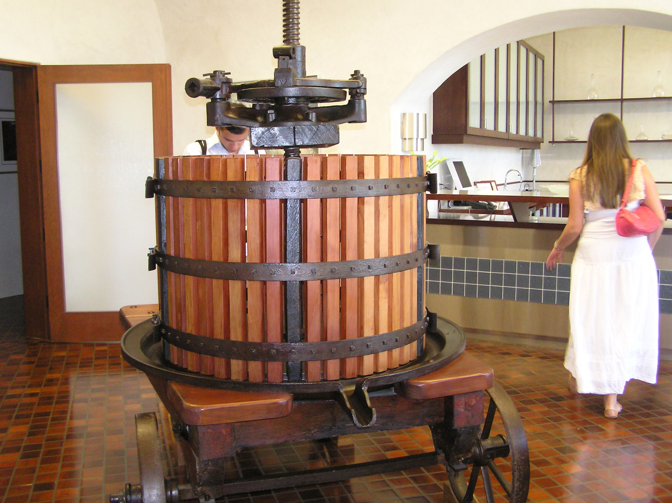 An antique grape press